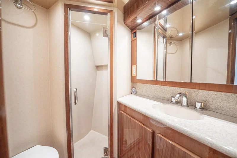 Manana Yacht Photos Pics Luxurious bathroom in 2007 Egg Harbor 43 SportYacht with shower and vanity.