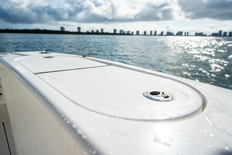 Manana Yacht Photos Pics 2007 Egg Harbor 43 SportYacht deck with ocean view and city skyline.