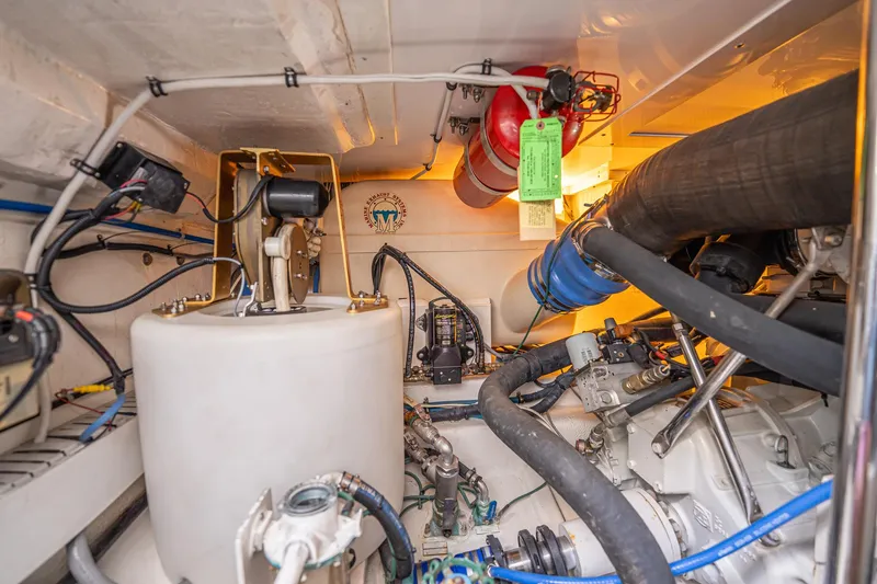Manana Yacht Photos Pics Engine room of a 2007 Egg Harbor 43 SportYacht with mechanical components and wiring.