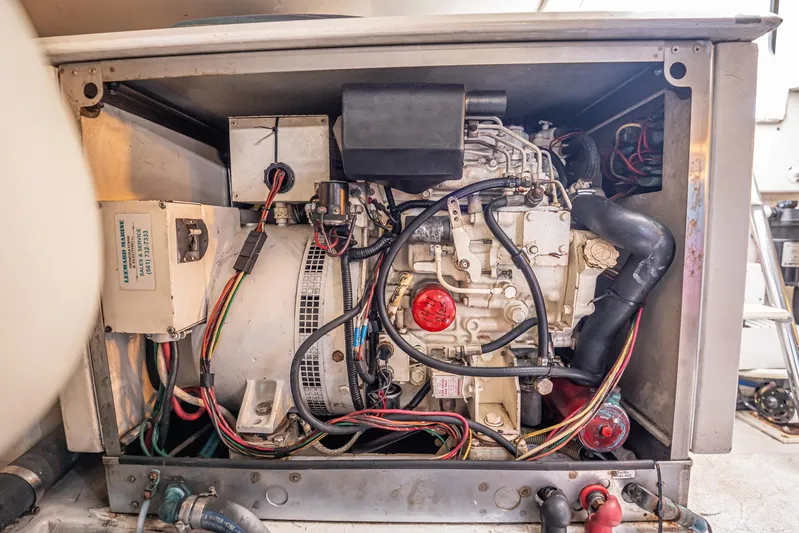 Manana Yacht Photos Pics Engine compartment of a 2007 Egg Harbor 43 SportYacht, showcasing wiring and components.