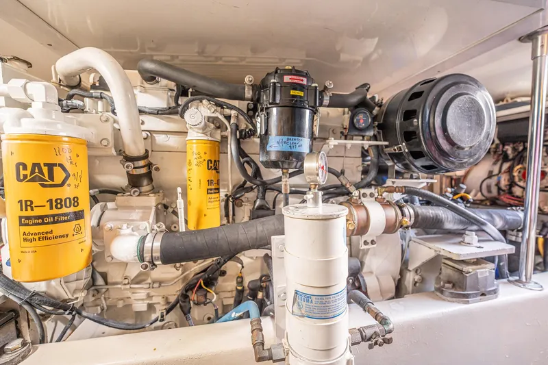 Manana Yacht Photos Pics Engine room of 2007 Egg Harbor 43 SportYacht with CAT oil filters and components.