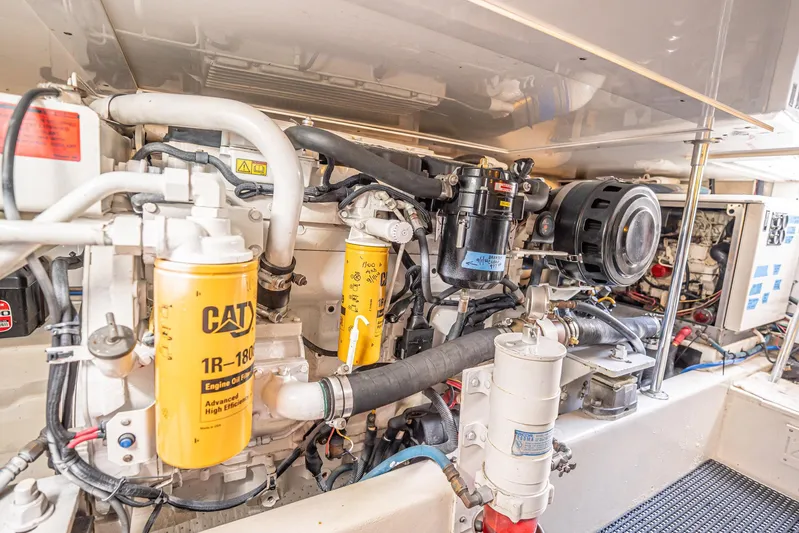 Manana Yacht Photos Pics Engine room of 2007 Egg Harbor 43 SportYacht with CAT components and detailed machinery.
