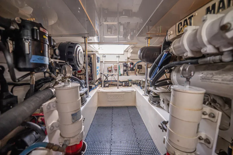 Manana Yacht Photos Pics Engine room of 2007 Egg Harbor 43 SportYacht, showcasing mechanical components and systems.