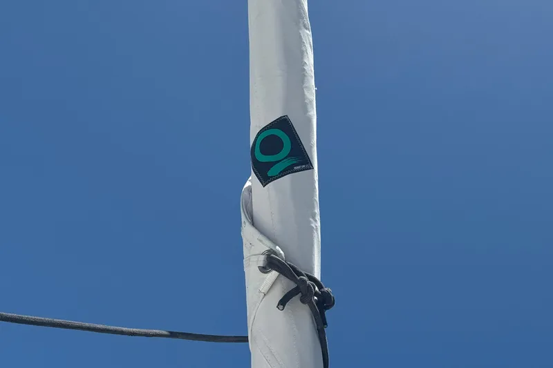 Ten:10 Yacht Photos Pics Sail of 2017 Fountaine Pajot SABA 50 catamaran against clear blue sky.