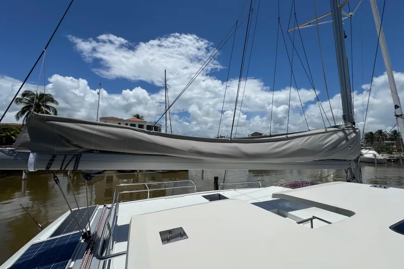 Ten:10 Yacht Photos Pics 2017 Fountaine Pajot SABA 50 catamaran docked under clear blue sky.