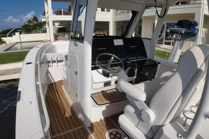  Yacht Photos Pics 2018 Everglades 335 Center Console boat interior with modern helm and seating.