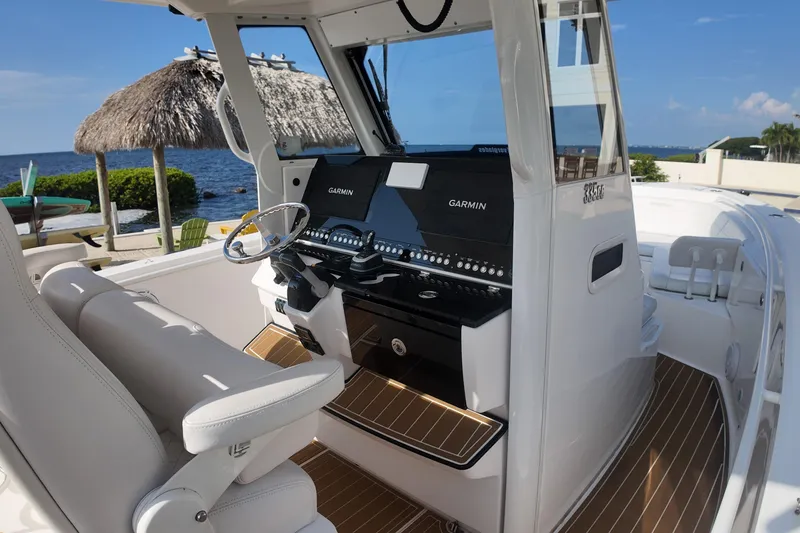  Yacht Photos Pics 2018 Everglades 335 Center Console boat interior with Garmin navigation system.