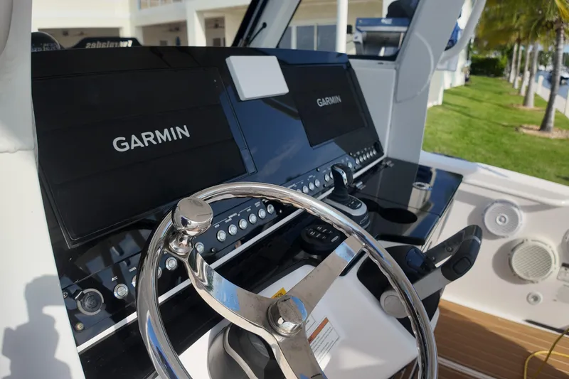  Yacht Photos Pics Control panel of 2018 Everglades 335 Center Console with Garmin displays.
