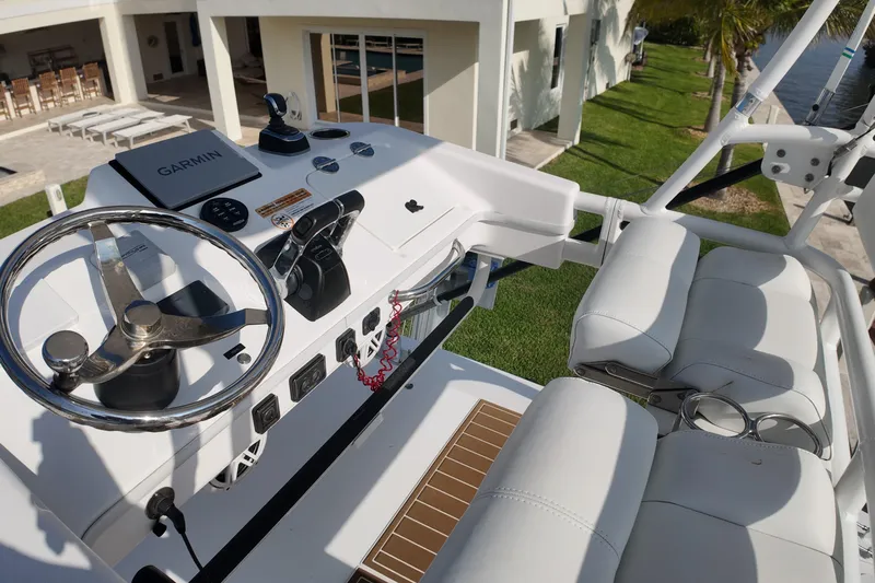  Yacht Photos Pics 2018 Everglades 335 Center Console boat helm with Garmin navigation system.