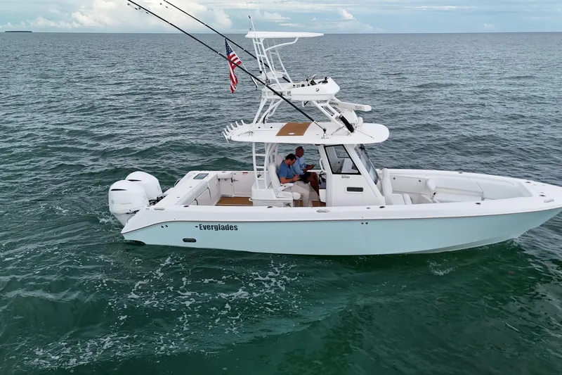  Yacht Photos Pics 2018 Everglades 335 Center Console boat cruising on open water.