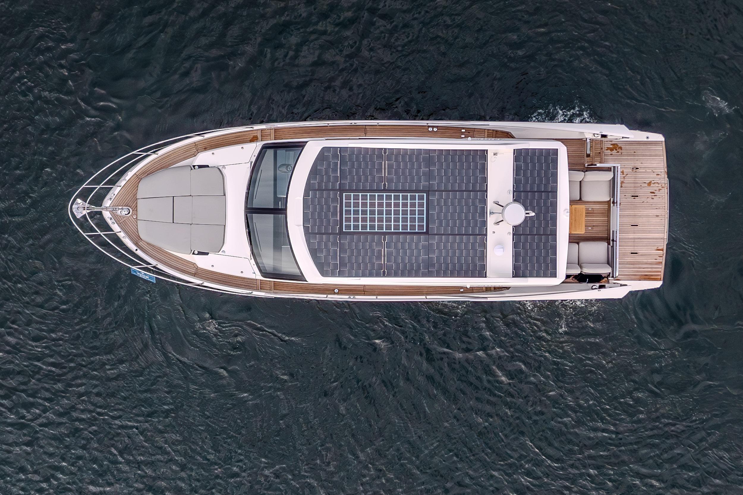 Aerial view of 2026 Absolute 48 Coupe yacht with solar panels on deck.