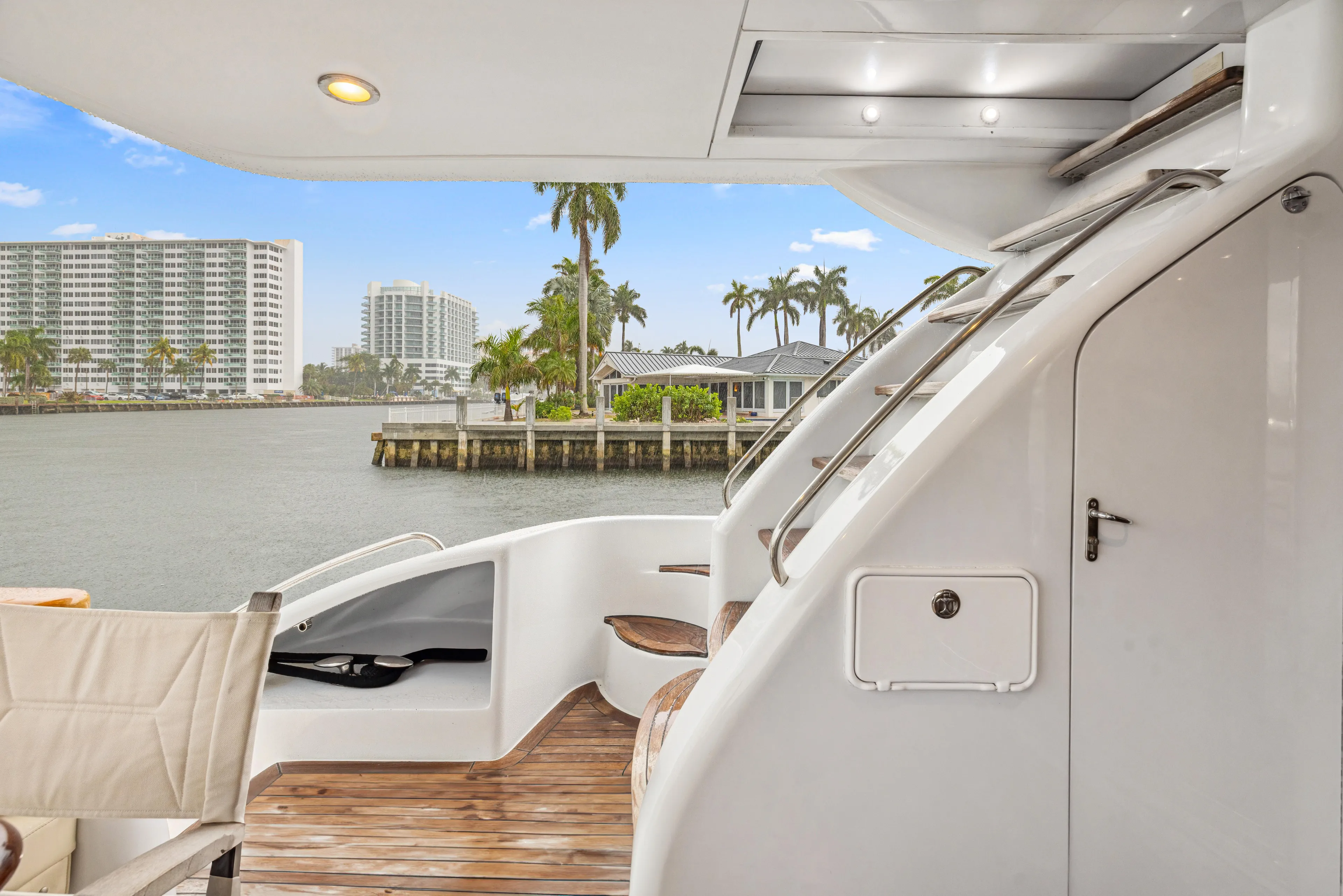 Corporate Approved 2 Yacht Photos Pics Luxurious 2005 Hatteras 80 Motor Yacht deck with waterfront view and modern amenities.