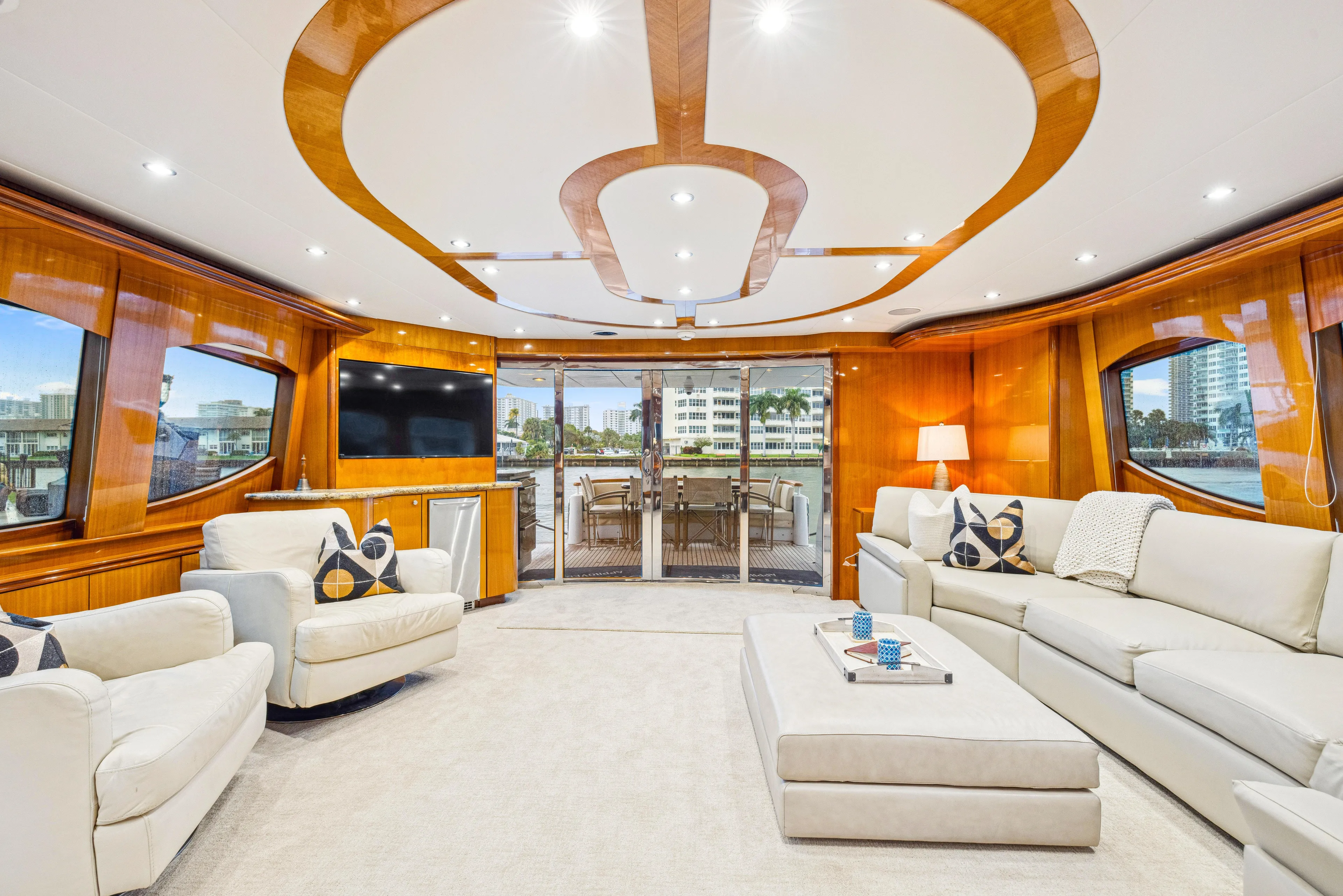 Corporate Approved 2 Yacht Photos Pics Luxurious interior of 2005 Hatteras 80 Motor Yacht with elegant seating and modern decor.