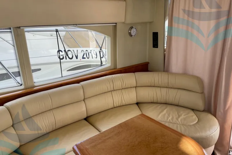  Yacht Photos Pics Luxurious interior of 2001 Azimut 42 Fly yacht with cream leather seating.