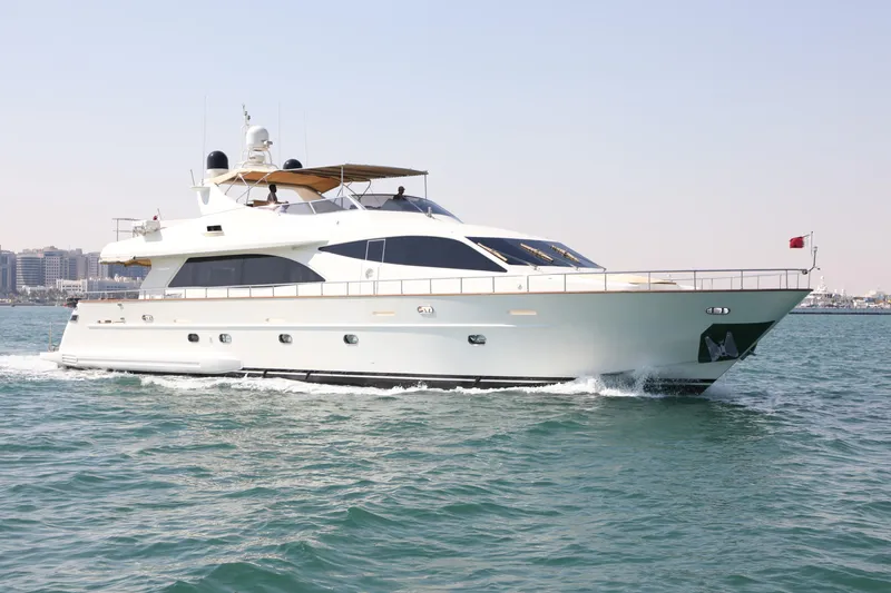  Yacht Photos Pics Luxury Falcon 90 yacht cruising on open water, 2005 model.