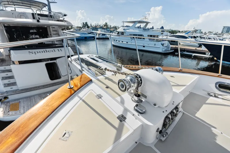 El Legado Yacht Photos Pics 2005 Grand Banks 72 Aleutian RP yacht docked at marina, featuring deck and winch.