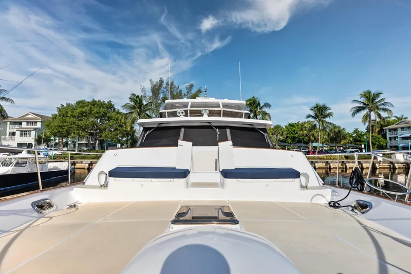 El Legado Yacht Photos Pics 2005 Grand Banks 72 Aleutian RP yacht docked, featuring spacious deck and modern design.