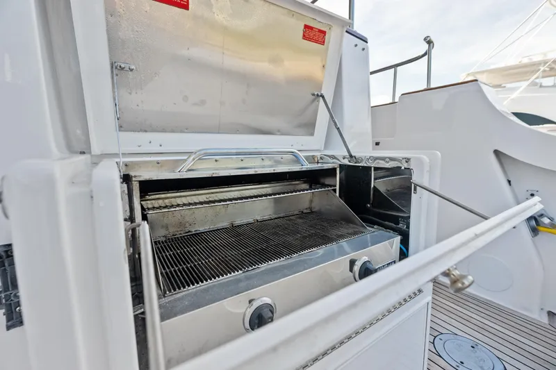 El Legado Yacht Photos Pics Outdoor grill on 2005 Grand Banks 72 Aleutian RP yacht deck.