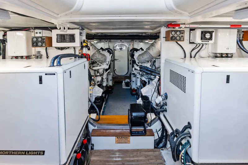 El Legado Yacht Photos Pics Engine room of 2005 Grand Banks 72 Aleutian RP yacht, featuring Northern Lights generators.