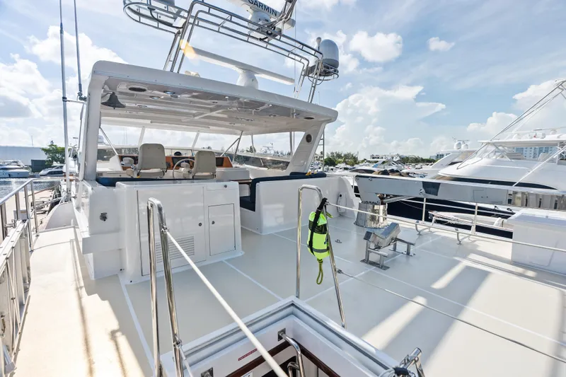 El Legado Yacht Photos Pics 2005 Grand Banks 72 Aleutian RP yacht deck with seating and navigation equipment.