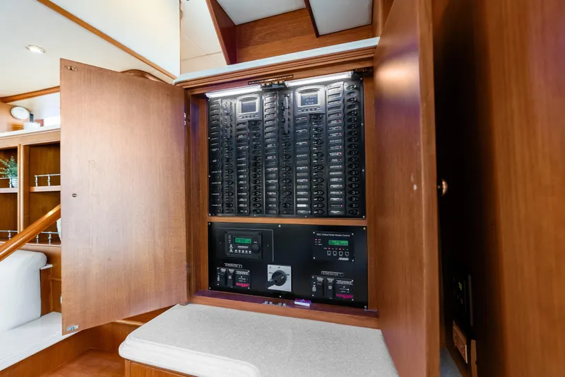 El Legado Yacht Photos Pics Electrical panel inside 2005 Grand Banks 72 Aleutian RP yacht, showcasing control systems.