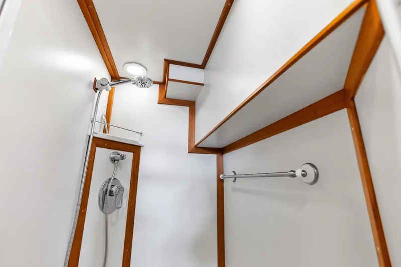 El Legado Yacht Photos Pics Shower area in 2005 Grand Banks 72 Aleutian RP yacht with modern fixtures.