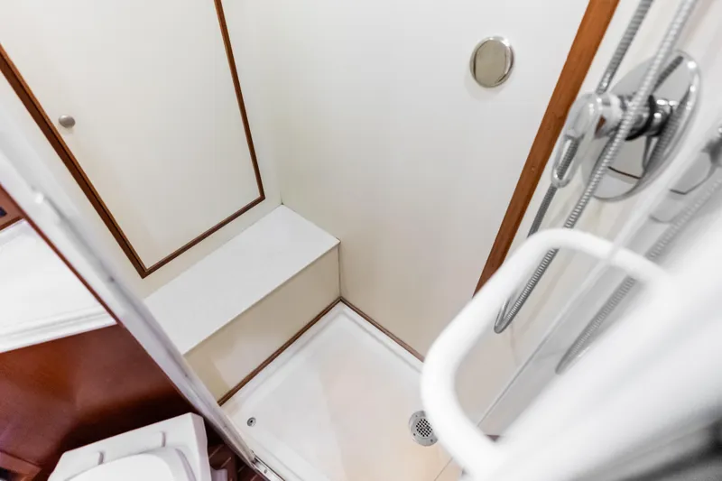 El Legado Yacht Photos Pics Shower area in 2005 Grand Banks 72 Aleutian RP yacht, featuring modern fixtures.