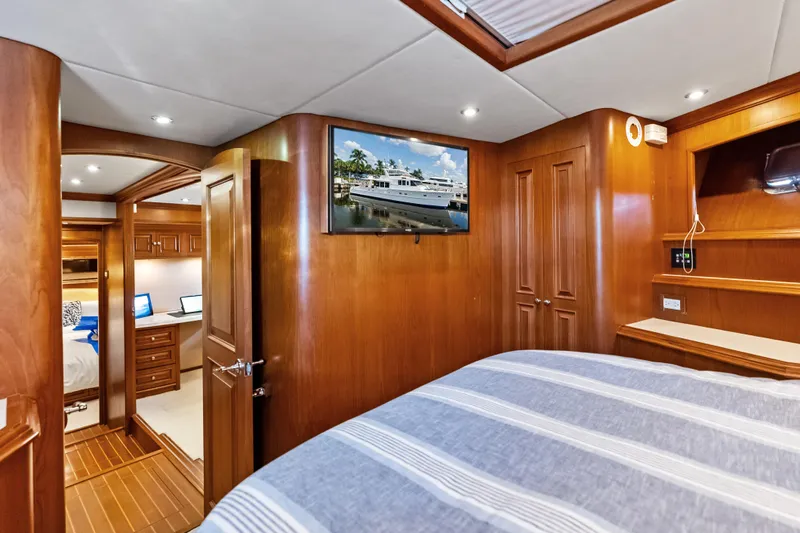 El Legado Yacht Photos Pics Luxurious 2005 Grand Banks 72 Aleutian RP yacht interior with wood paneling and modern amenities.