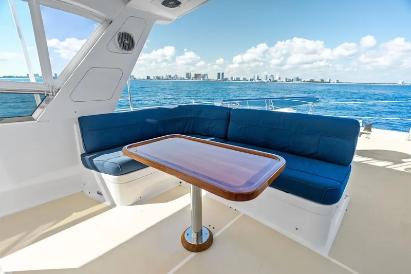 El Legado Yacht Photos Pics Luxurious seating area on 2005 Grand Banks 72 Aleutian RP yacht with ocean view.