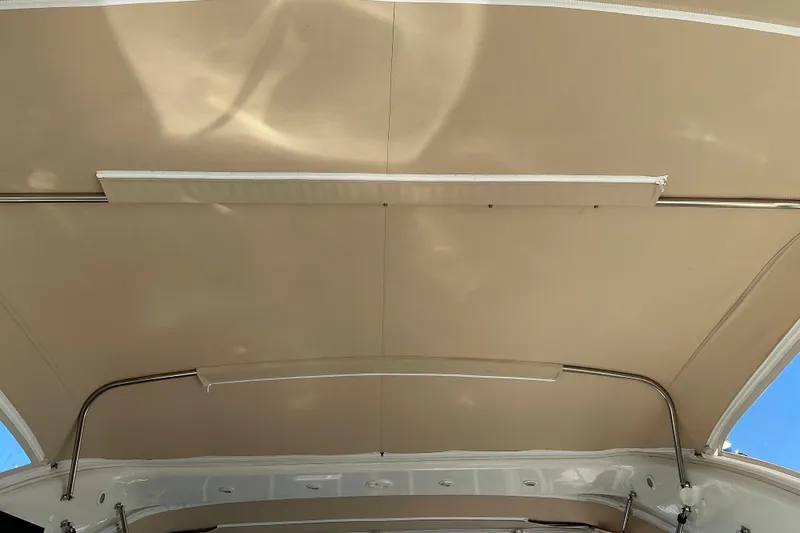 Knee Deep Yacht Photos Pics 2003 Regal Commodore 4260 boat canopy with metal support bars.