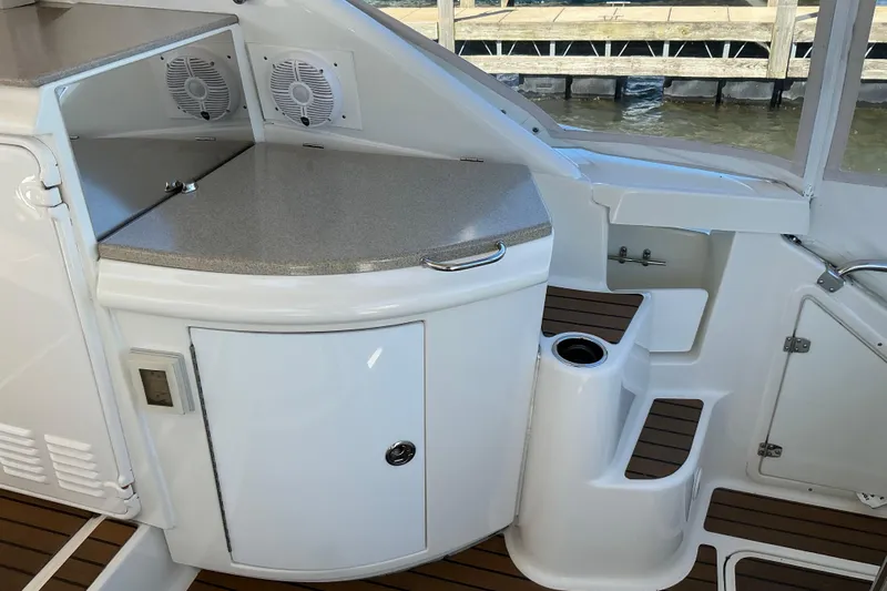 Knee Deep Yacht Photos Pics 2003 Regal Commodore 4260 yacht interior with sleek cabinetry and modern design.