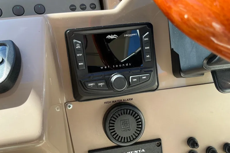 Knee Deep Yacht Photos Pics Dashboard of a 2003 Regal Commodore 4260 with Wet Sounds audio system.