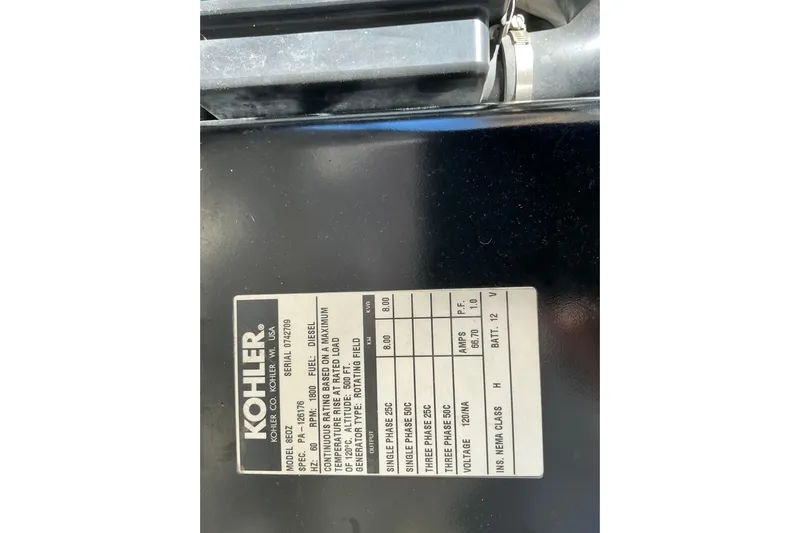 Knee Deep Yacht Photos Pics Kohler generator label on 2003 Regal Commodore 4260, displaying specifications and serial number.