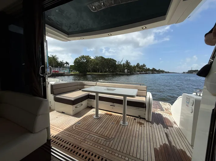 Keep Paddlin Yacht Photos Pics 2019 Galeon 430 HTC yacht interior with seating area overlooking serene water view.