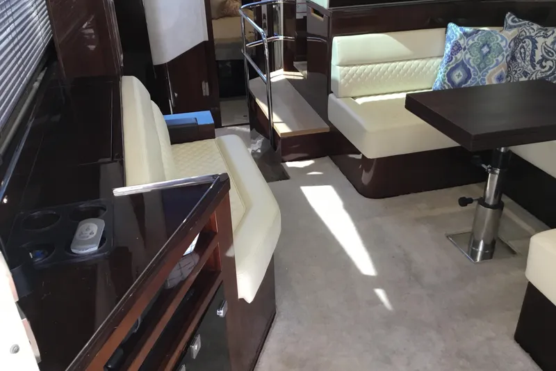 Keep Paddlin Yacht Photos Pics Luxurious interior of 2019 Galeon 430 HTC yacht with elegant seating and dining area.