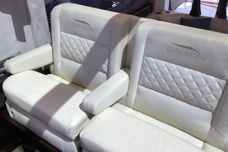 Keep Paddlin Yacht Photos Pics Luxurious white leather seats on a 2019 Galeon 430 HTC yacht interior.