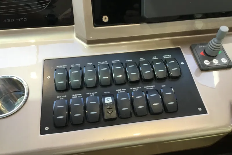 Keep Paddlin Yacht Photos Pics Control panel of 2019 Galeon 430 HTC yacht with labeled switches and joystick.