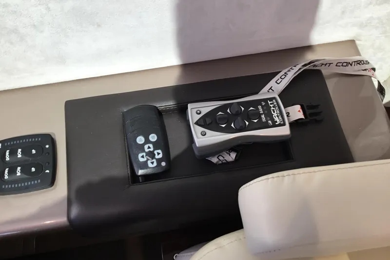 Keep Paddlin Yacht Photos Pics Control panel of 2019 Galeon 430 HTC yacht with remote and buttons.