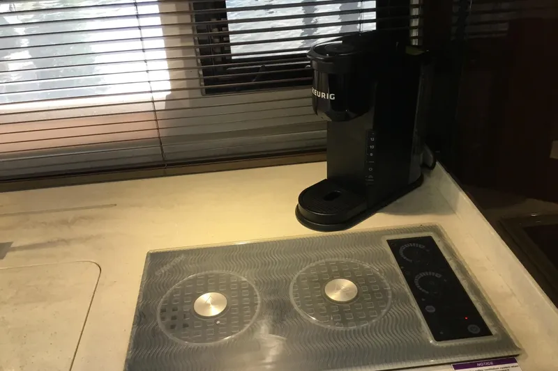 Keep Paddlin Yacht Photos Pics Modern kitchen in 2019 Galeon 430 HTC yacht with stovetop and coffee maker.