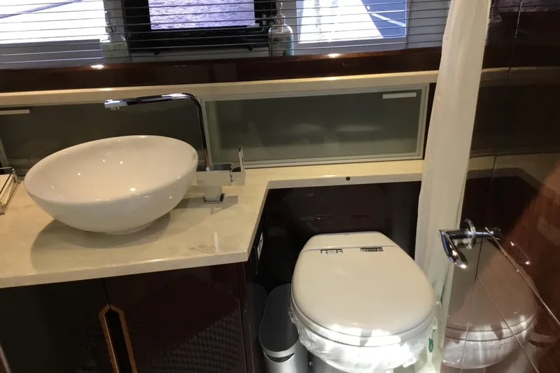 Keep Paddlin Yacht Photos Pics Luxurious bathroom in 2019 Galeon 430 HTC yacht with modern sink and toilet.