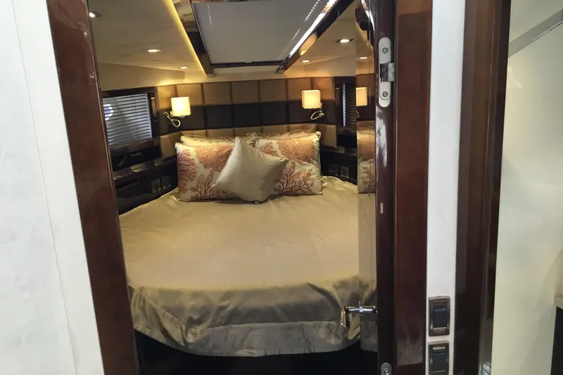 Keep Paddlin Yacht Photos Pics Luxurious bedroom interior of 2019 Galeon 430 HTC yacht with elegant bedding and lighting.