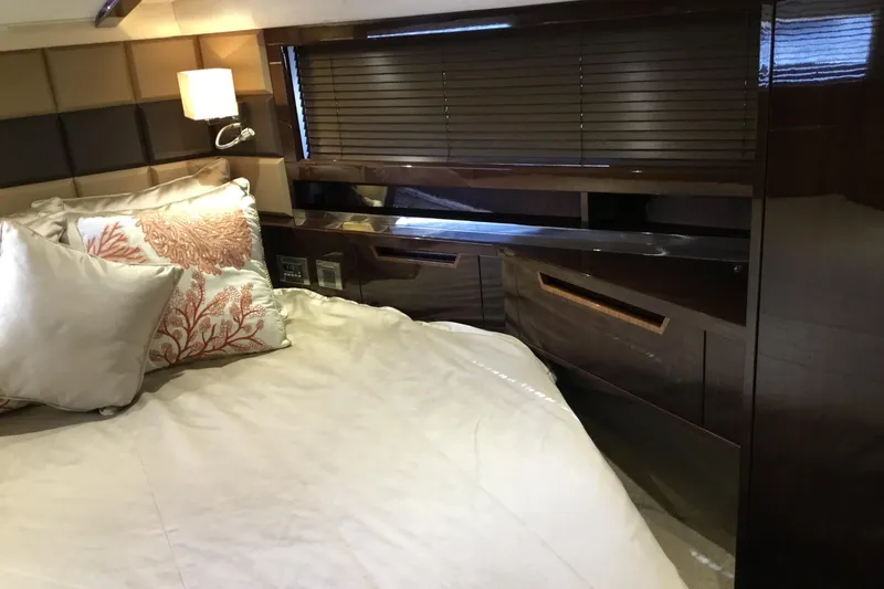 Keep Paddlin Yacht Photos Pics Luxurious bedroom interior of 2019 Galeon 430 HTC yacht with elegant bedding and wood finishes.