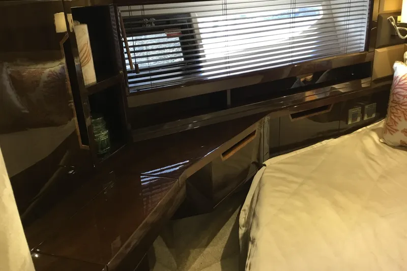 Keep Paddlin Yacht Photos Pics Luxurious interior of 2019 Galeon 430 HTC yacht with sleek wood finish and comfortable bedding.