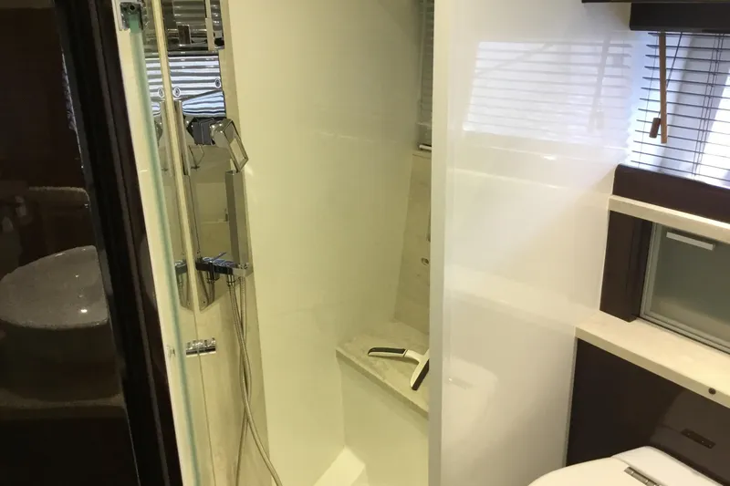 Keep Paddlin Yacht Photos Pics Modern bathroom interior on 2019 Galeon 430 HTC yacht, featuring sleek shower design.
