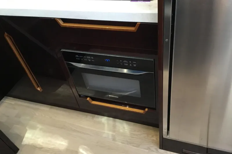 Keep Paddlin Yacht Photos Pics Modern kitchen appliance setup in 2019 Galeon 430 HTC yacht interior.