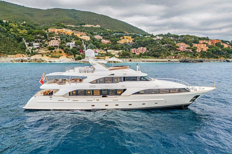 Giorgia I Yacht Photos Pics Luxury Benetti Classic 120 yacht from 2009 cruising near scenic coastline.