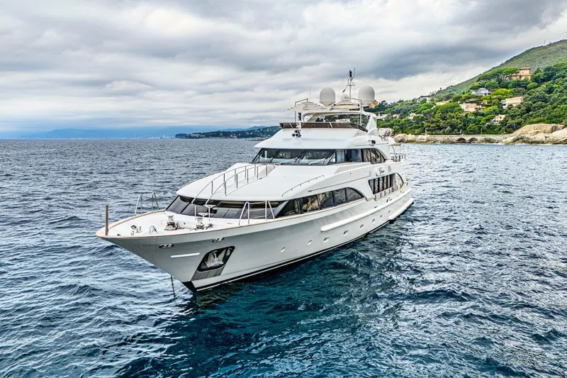 Giorgia I Yacht Photos Pics Luxury Benetti Classic 120 yacht from 2009 cruising near a scenic coastline.