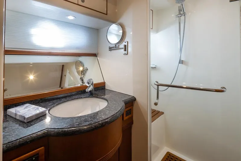 Raindancer Yacht Photos Pics Luxurious bathroom in 2009 Selene 60 Ocean Trawler yacht with modern fixtures and shower.