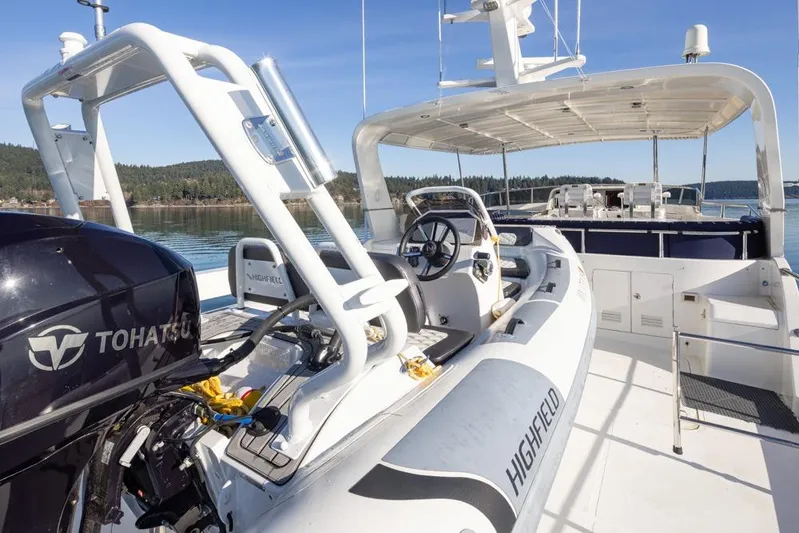Raindancer Yacht Photos Pics 2009 Selene 60 Ocean Trawler with Highfield tender and Tohatsu engine on deck.