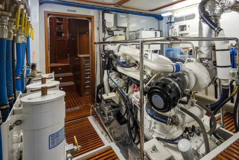 Raindancer Yacht Photos Pics Engine room of 2009 Selene 60 Ocean Trawler with visible machinery and equipment.
